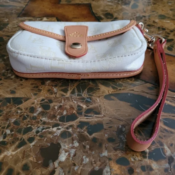 Dooney and Bourke Elegant Cream and Tan Women's pouch - Picture 3 of 4